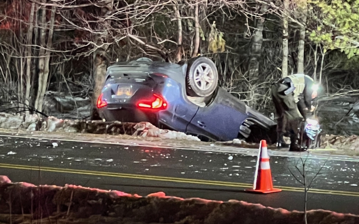 Car flips into a ditch in Greenwood