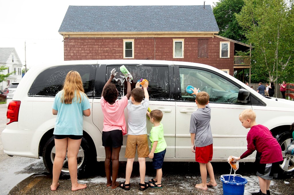 Photos: Church car wash raises funds to send youth to summer camp