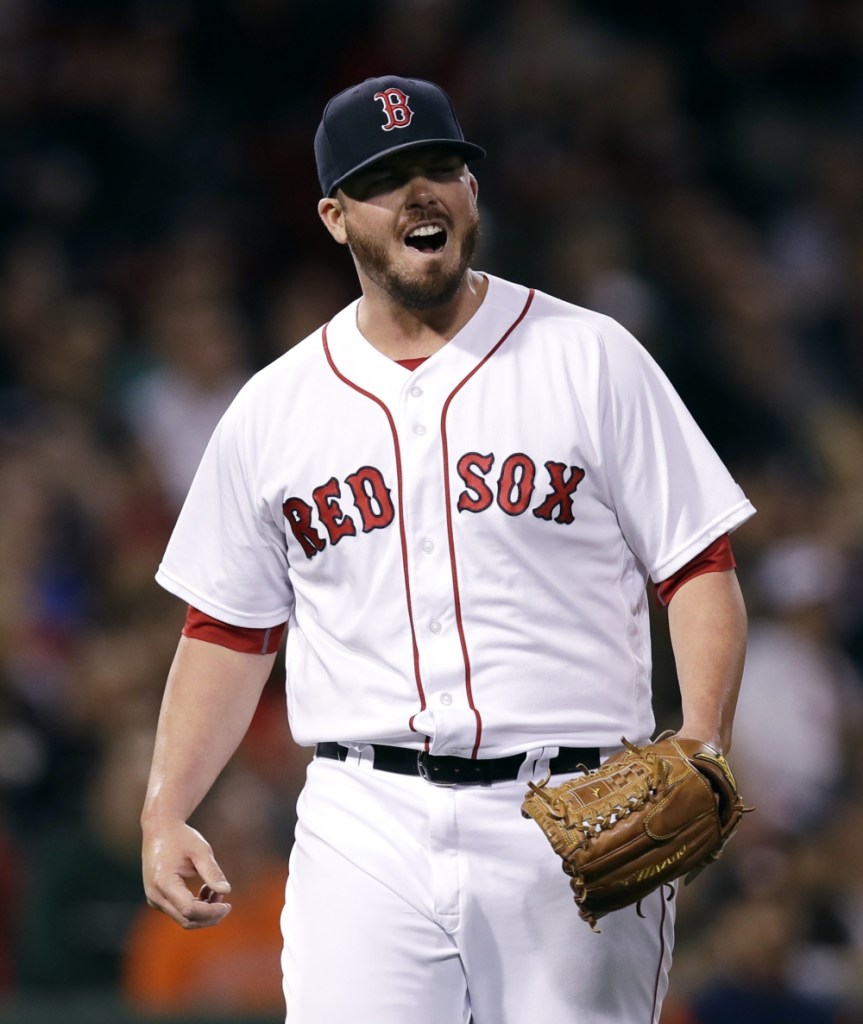 Boston Red Sox relief pitcher Austin Maddox reacts during the sixth inning of a game at Fenway Park in September 2017 in Boston.