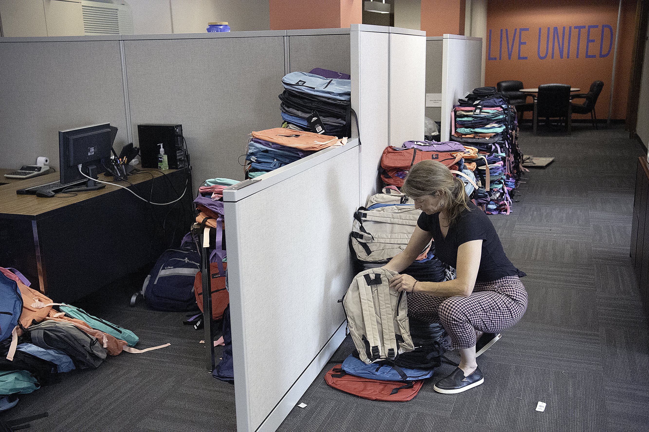 Photo Album: United Way, businesses fill backpacks with back-to-school supplies